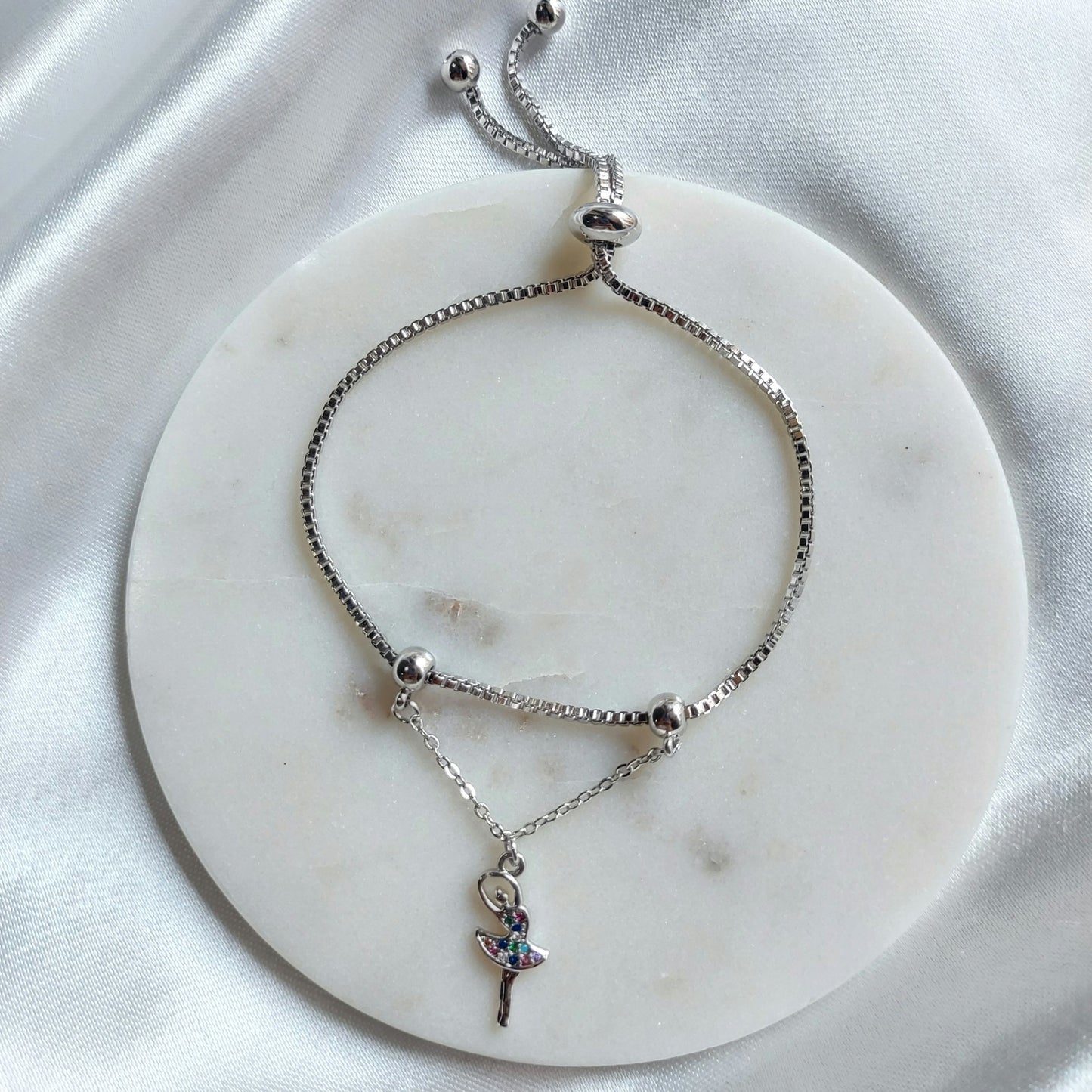 Dancing doll charm braclet