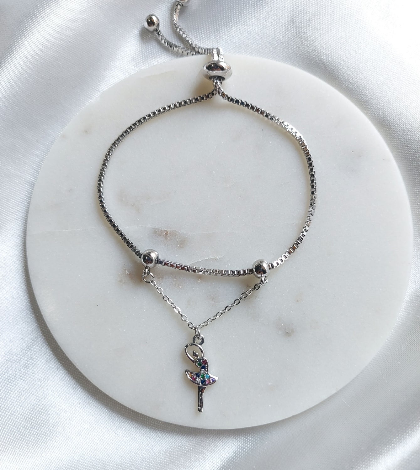 Dancing doll charm braclet