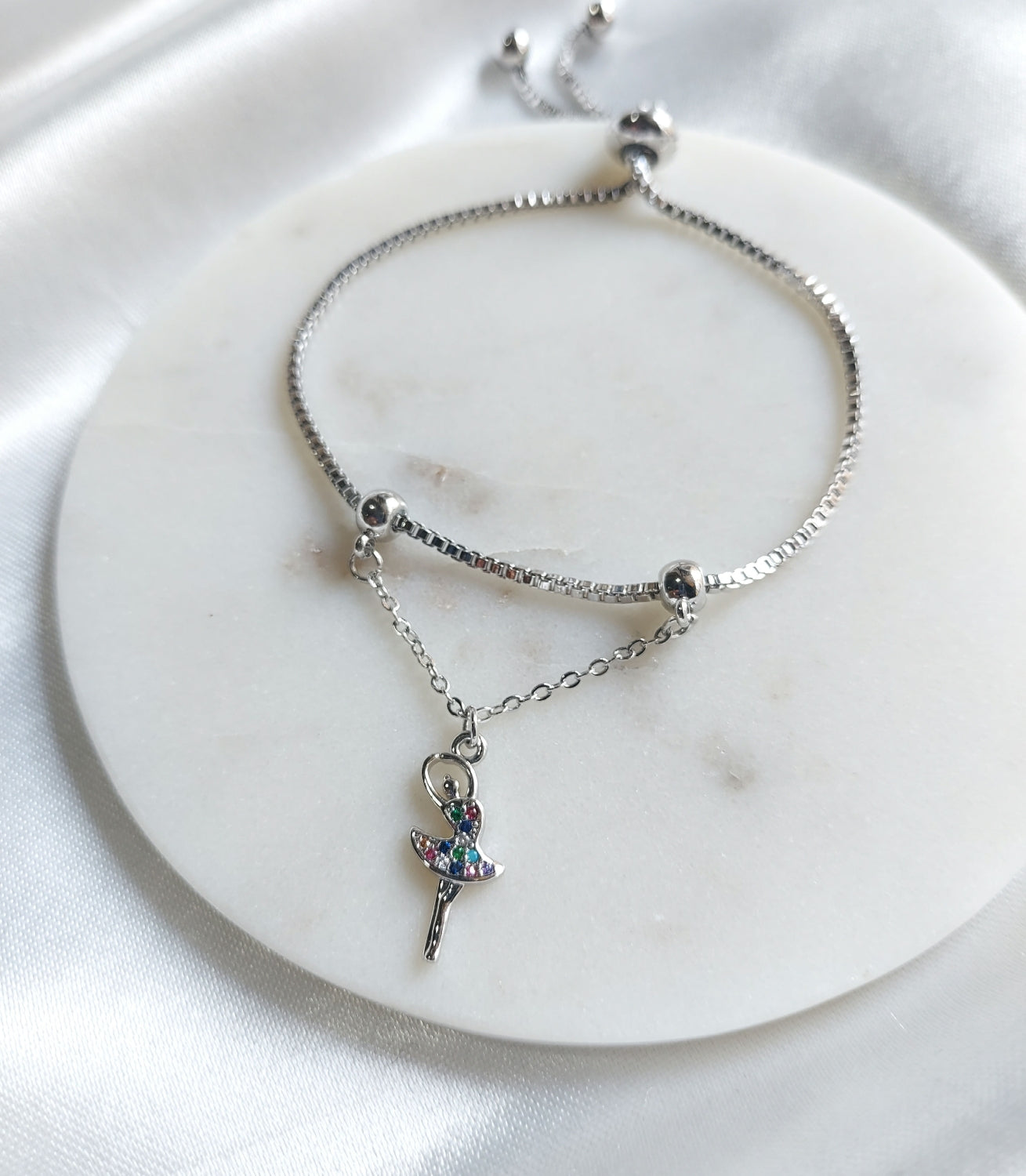 Dancing doll charm braclet